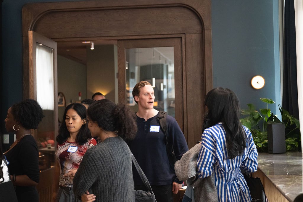 Participants moving between stations at POV