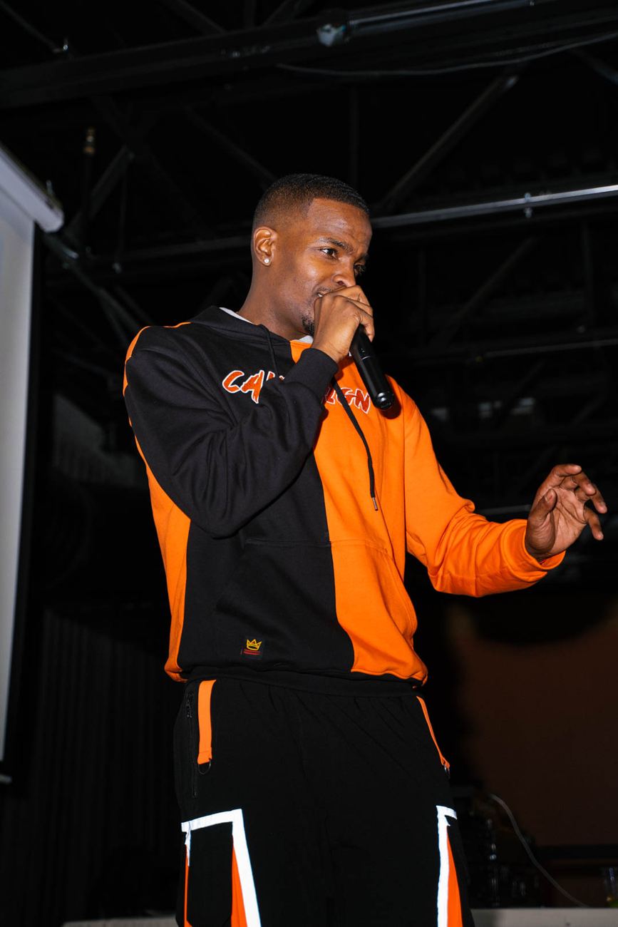 Hail Zel on the mic onstage